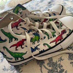 High top Converse Chuck Taylor’s, kids size 13. Dinosaur print